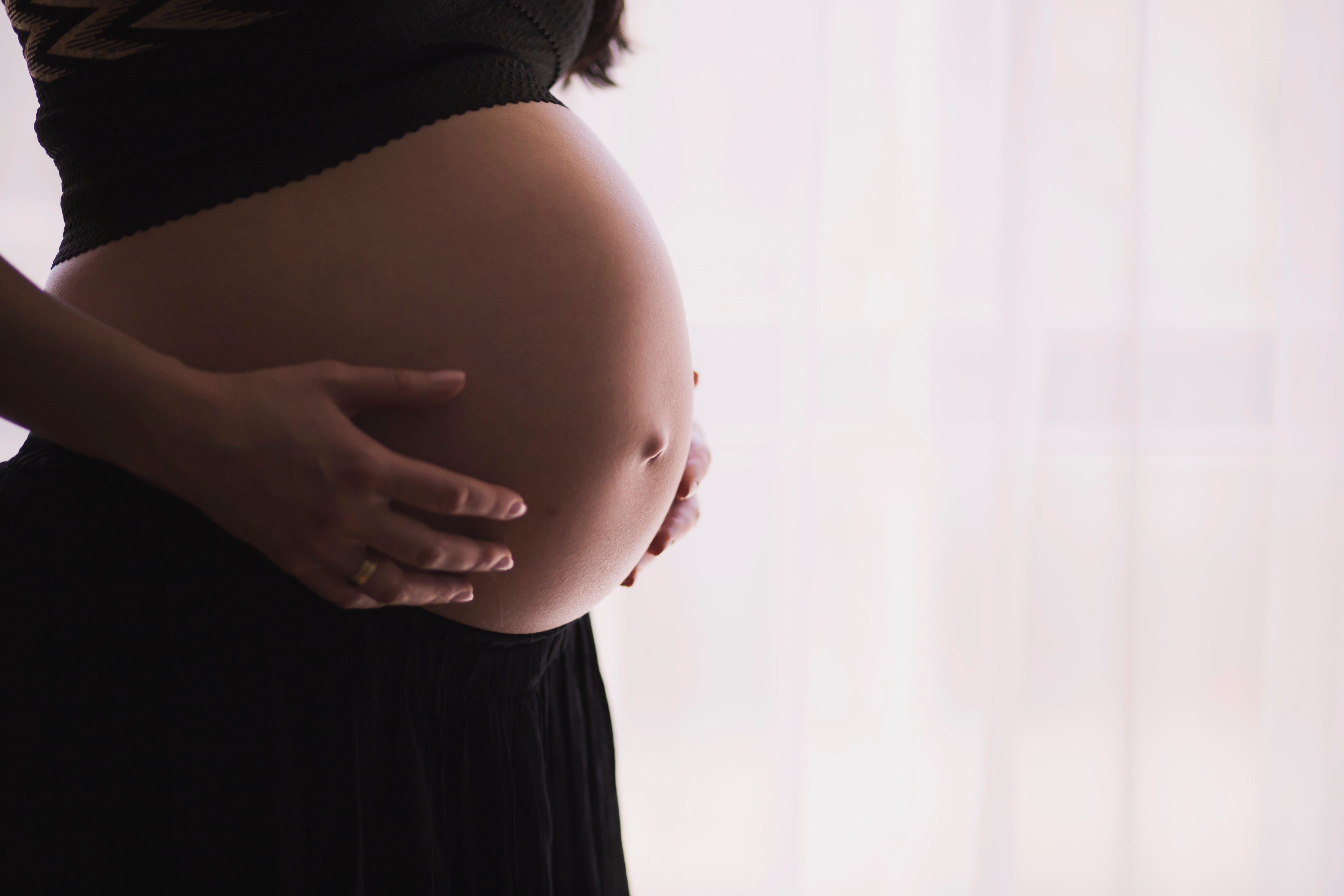 pregnant-mom-holds-her-belly