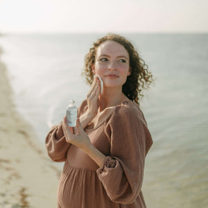 woman-applies-facial-tonic-with-a-cotton-round