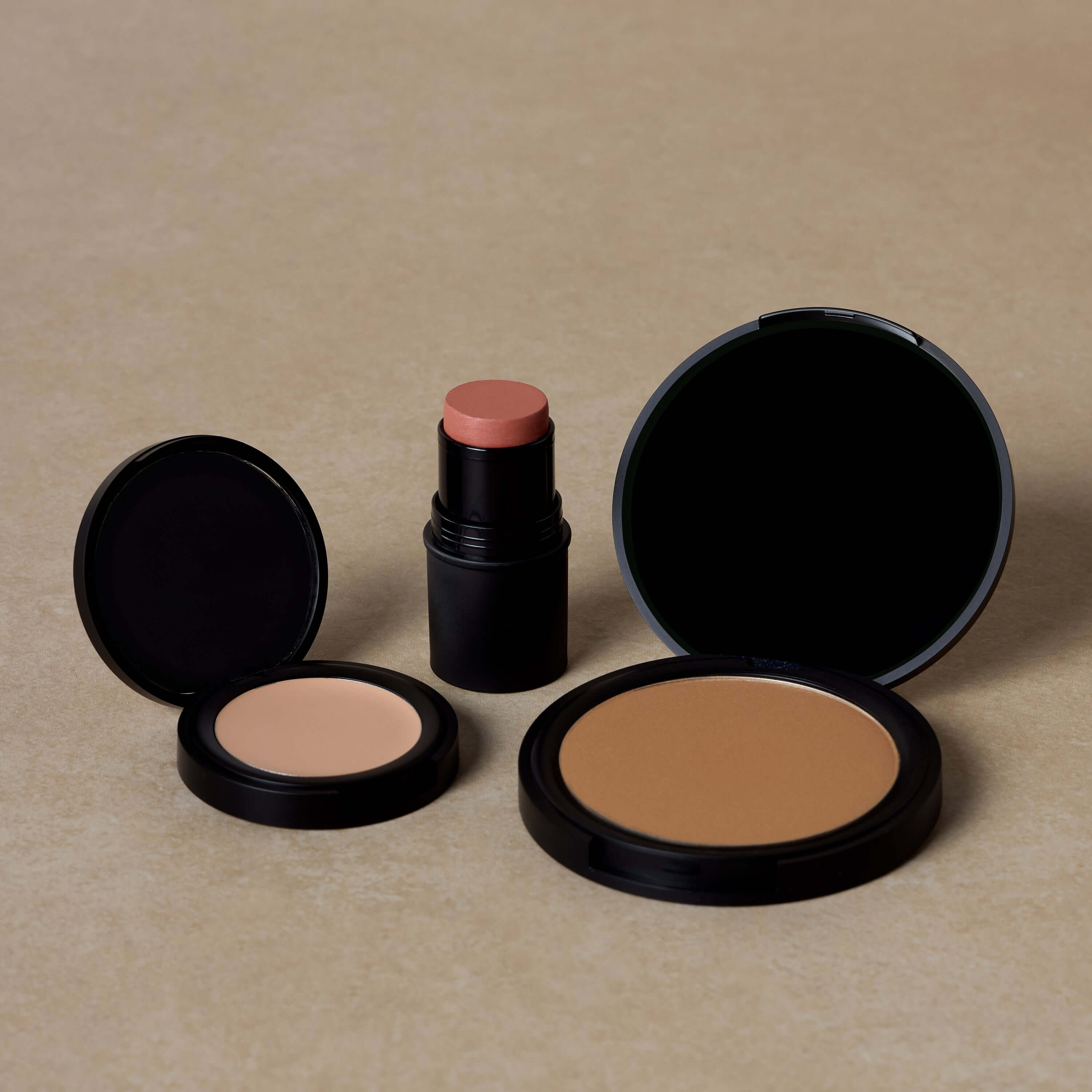 golden-hour-nontoxic-contour-makeup-shades-displayed-on-brown-background
